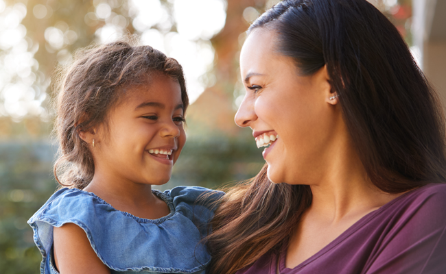 BSCP home page pointer to Parents: image of a mother holding a young child